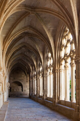 Fototapeta na wymiar Arched gallery in the monastery of Santa Maria de Santes Creus (Aiguamurcia). Catalonia, Spain