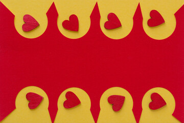 grungy wooden hearts painted red set against a fancy paper design