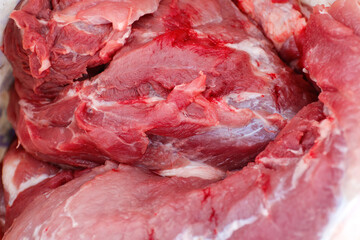 Defocus texture or background of tasty fresh meat of big, pork. Red beef meat close up texture....