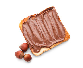 Bread with chocolate paste and hazelnuts on white background