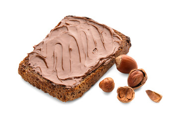 Bread with chocolate paste and hazelnuts on white background