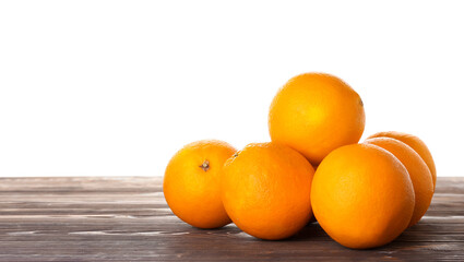 Fresh ripe oranges on wooden table against white background