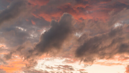 sunset with clouds in the orange sky