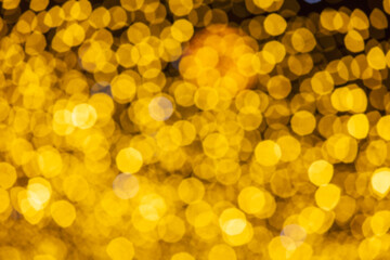 Holiday lights in out of focus. Christmas lights. Holiday background. Winter illuminations.