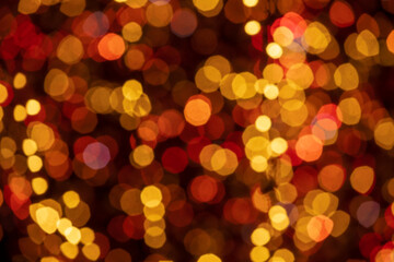 Holiday lights in out of focus. Christmas lights. Holiday background. Winter illuminations.