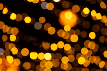 Holiday lights in out of focus. Christmas lights. Holiday background. Winter illuminations.