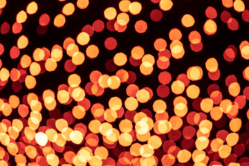Holiday lights in out of focus. Christmas lights. Holiday background. Winter illuminations.
