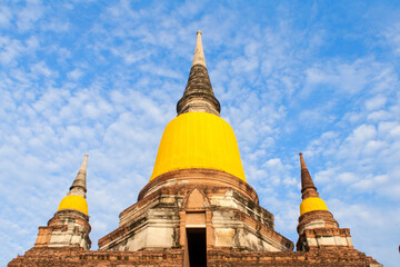 Naklejka premium Ancient Wat Yai Chai Mongkhon pagoda and buddha at Ayutthaya Thailand.