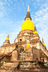 Fototapeta premium Ancient Wat Yai Chai Mongkhon pagoda and buddha at Ayutthaya Thailand.
