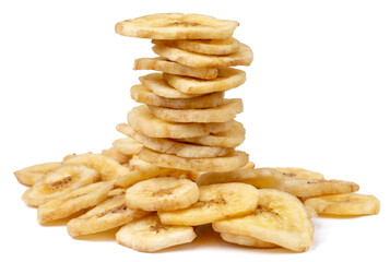 A stack of banana chips stands on a bunch of chips.