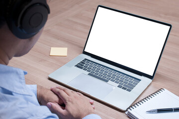 Businessman hands clasped together and white screen background mock up on display laptop with clipping path