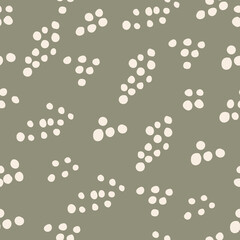 Illustration vector seamless repeat pattern of silhouette polka dot on a green background. Great for fall-themed vintage fabric, wallpaper, scrapbooking projects. The surface pattern design.