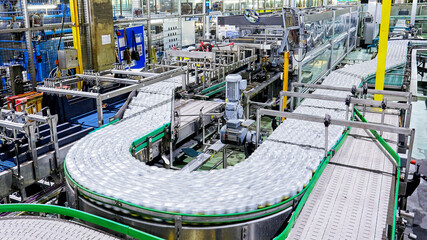 Beverage cans on conveyor belt