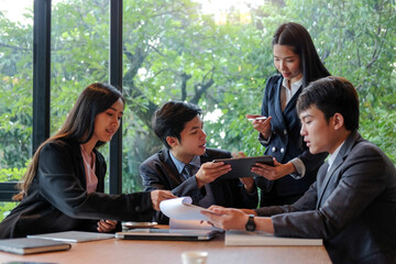 Businesspeople working on their project in office room.