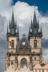 Fototapeta na wymiar Travel to Czech Republic. Tyn Church spectacular building in Prague in a beautiful summer day, in the Old Town Square. Landmarks of Prague.