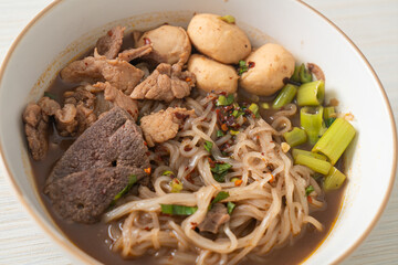 Thai noodle with pork, stewed pork, meatball and pork liver in blood soup
