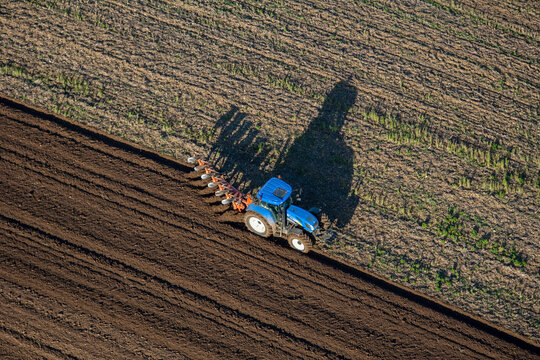 Aerial Farm Tractor Plowing a Field Vigneulles les Huttonchâtel Lorraine France
