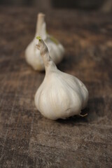 Fresh garlic on a wooden table