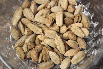 Closeup shot of a bunch of cardamom on a bowl