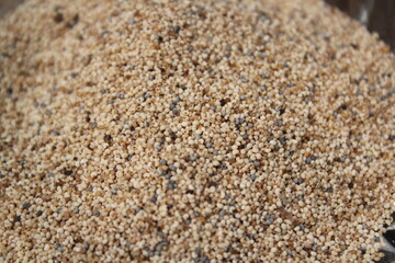 White poppy seeds on a glass bowl
