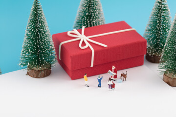 Santa Claus sends out Christmas gifts in miniature scene