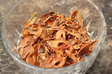 Myristica fragrans spice on a glass bowl