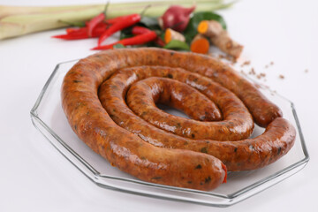 Local Northern Thai food , Northern Thai spicy sausage street food isolated in white background