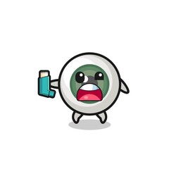 eyeball mascot having asthma while holding the inhaler