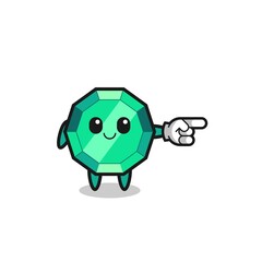emerald gemstone mascot with pointing right gesture
