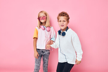 cute smiling kids stylish clothes headphones fun Childhood lifestyle concept