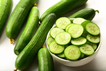 Healthy vegan diet appetizer foods- bowl of delicious fresg green cucumber salad with herbs.