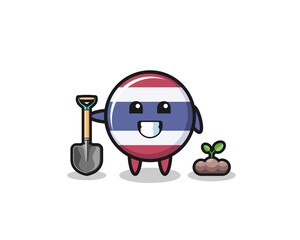 Fototapeta premium cute thailand flag cartoon is planting a tree seed