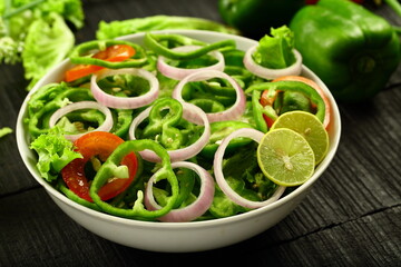 Homemade delicious vegetarian diet meal- fresh green capsicum salad.