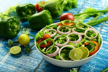 Healthy vegetarian diet meal- fresh green capsicum , paprika salad.