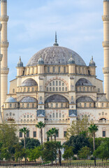 Fototapeta na wymiar Sabanci Central Mosque in Adana, Turkey on Seyhan River. One of the largest mosques in Turkey with 6 minarets. 