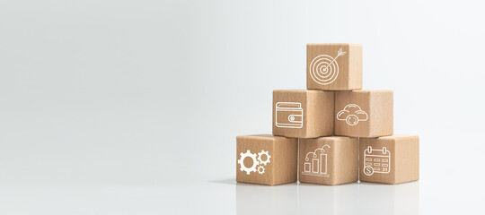 target board which is printed on wooden cube block on mechanical gear and business icon for creative and set up business objective target goal concept.