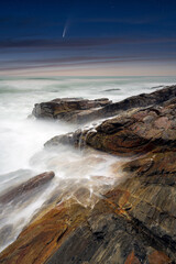 waves and rocks at night