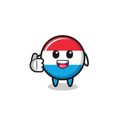 luxembourg mascot doing thumbs up gesture