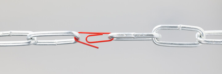 Chrome chain in middle with red paper clip