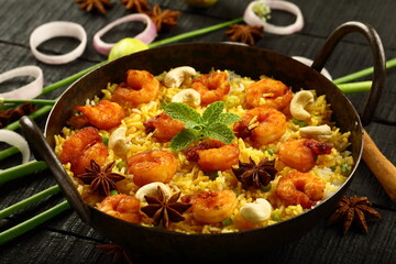 Indian street foods- spicy seafood fried rice with prawns and shrimps.