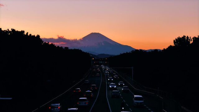silhouette of mt.fuji at dusk in chigasaki city on the road, kanagawa prefecture.
