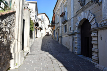 A small street between the old houses of Picerno, a small town in the province of Potenza in Basilicata, Italy.