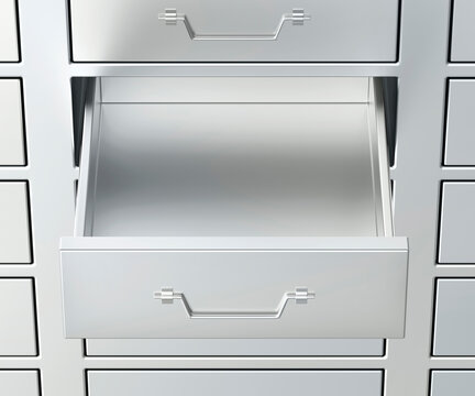 File cabinet with an open drawer, empty inside