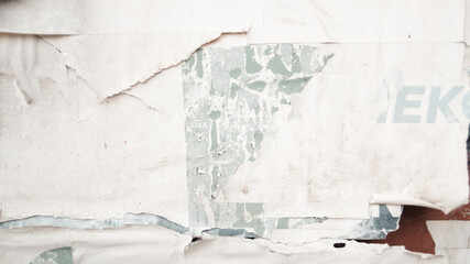 Fototapeta premium Grunge ripped poster background. Abstract weathered paper texture.