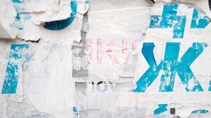 Grunge ripped poster background. Abstract weathered paper texture.