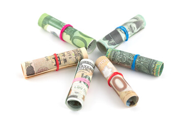 Several different foreign currencies on white background
