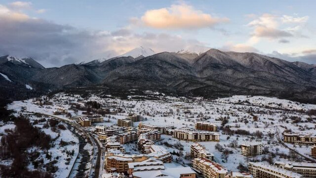 Time lapse video with an aerial winter view of famous ski resort of Bansko, Blagoevgrad Region, Bulgaria