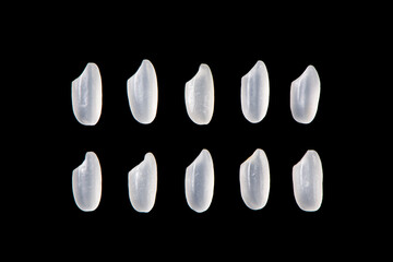 White rice isolated on black background
