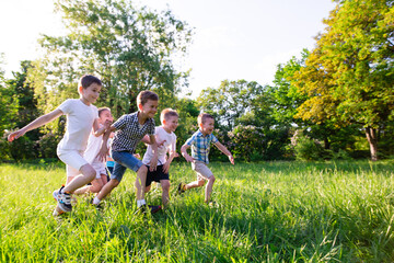 children play outdoors running and having fun