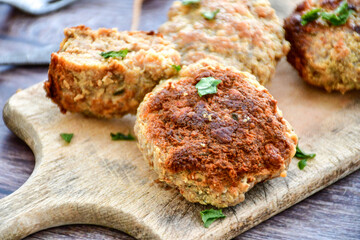 Home made  fried meatballs   on wooden rustic background.Cutlets from beef and pork meat.